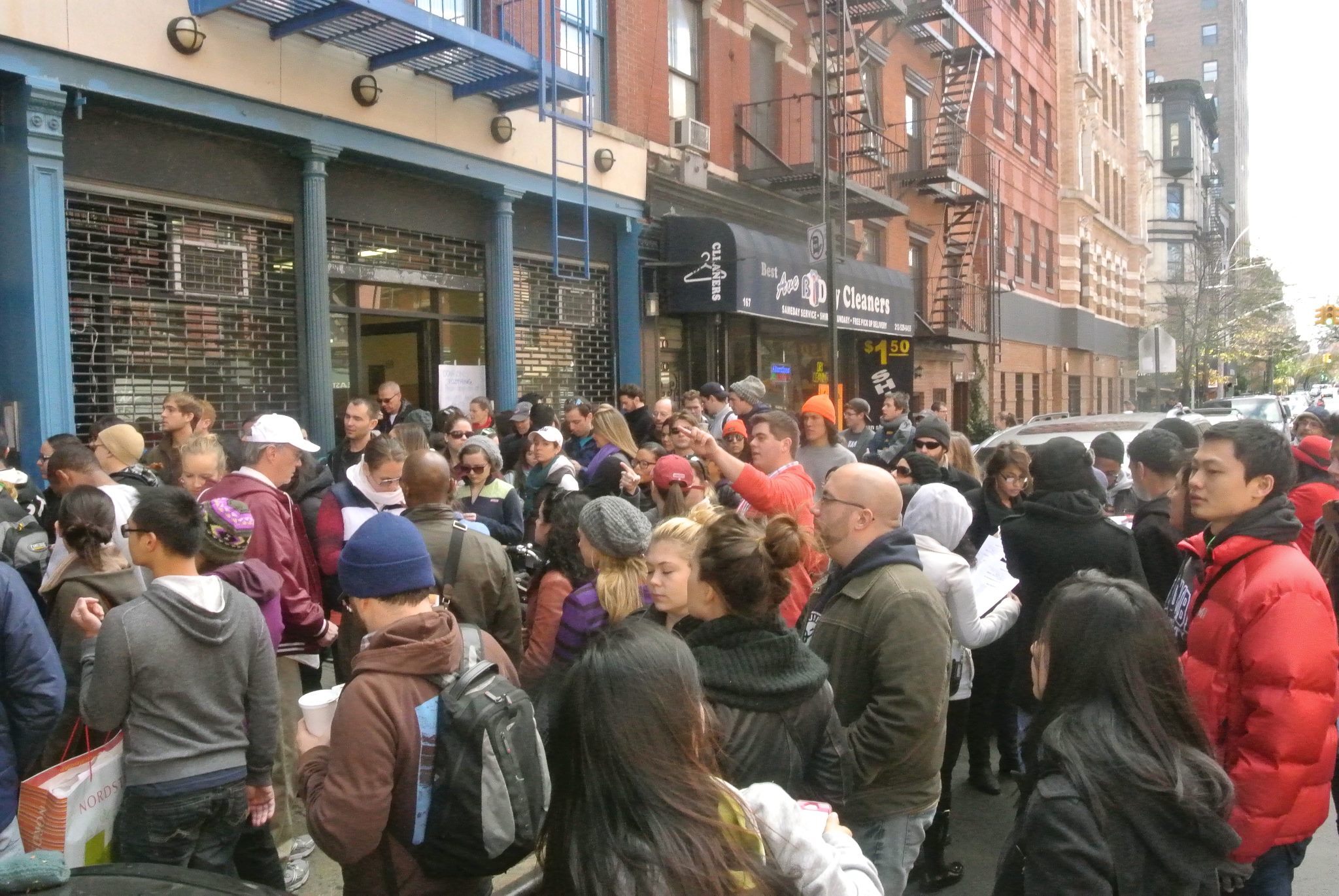 Volunteers gather outside the GOLES office in the days after Superstorm Sandy. Photo Credit: Damaris Reyes