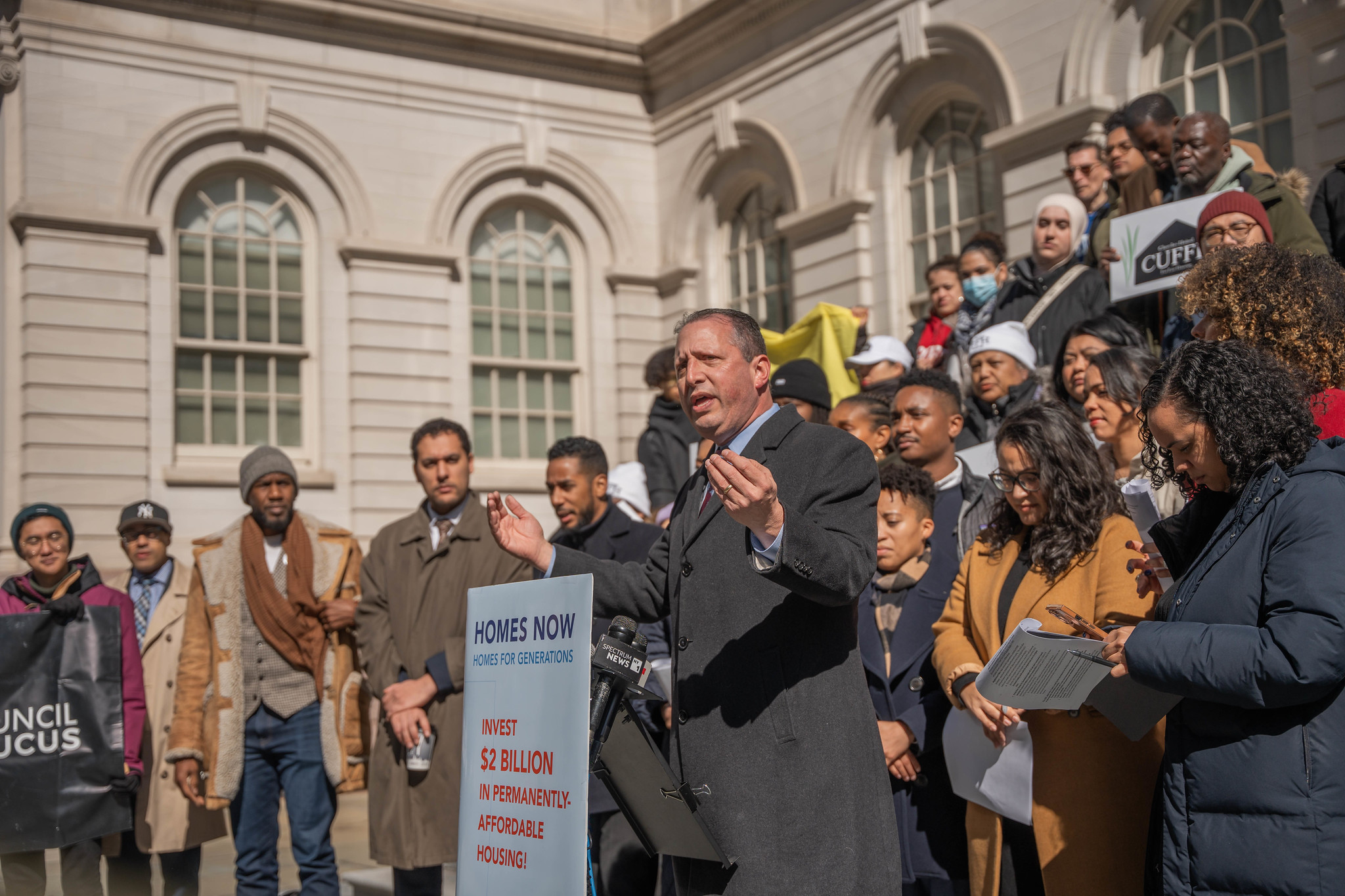 NYC Comptroller Brad lander speaks at a press conference announcing the launch of the Housing Now Housing For Generations campaign in front of a group of advocates on the steps of New York City Hall